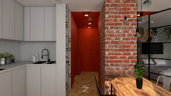 Wnętrze kuchni z industrialnym i minimalistycznym stylem, czerwonymi akcentami.