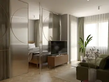 Wnętrze w stylu soft minimalizm z przeszklonymi ściankami i roślinami.