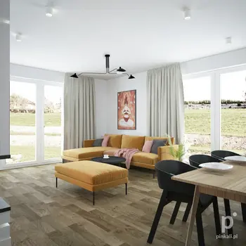 Wnętrze salonu minimalistycznego z pomarańczową sofą i drewnianym stołem.