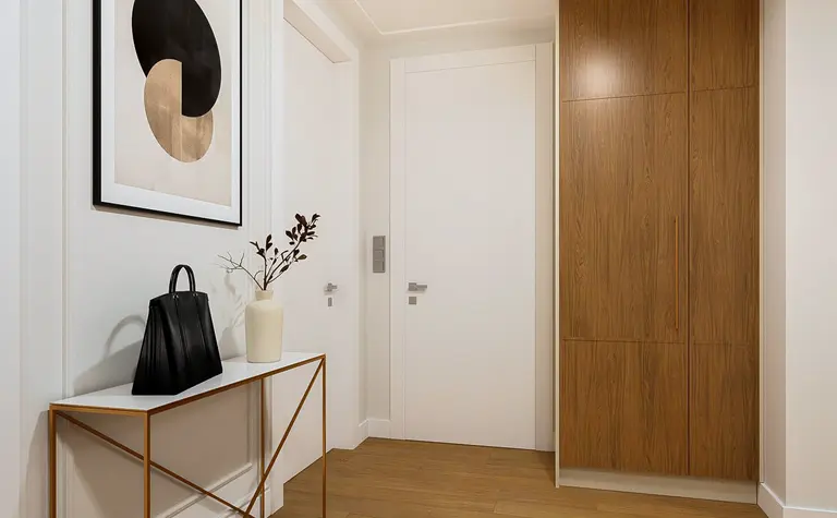 Przedpokój w stylu art deco z nowoczesnymi akcentami quiet luxury.