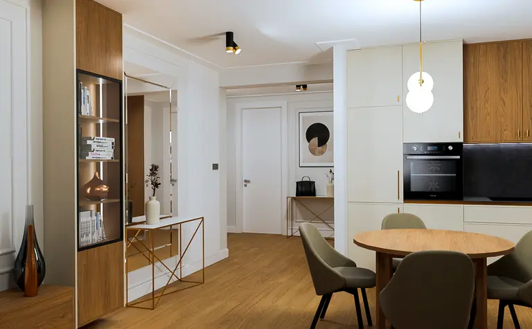 Wnętrze kuchni w stylu art deco z nowoczesnymi elementami.