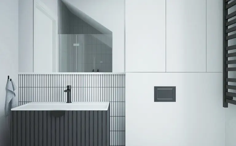 Nowoczesna łazienka z minimalistycznym designem, białą umywalką i szarym wykończeniem.