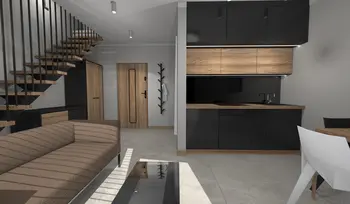 Nowoczesne wnętrze kuchni z szafkami w kolorze czarnym, drewnianymi akcentami i minimalistycznym designem.
