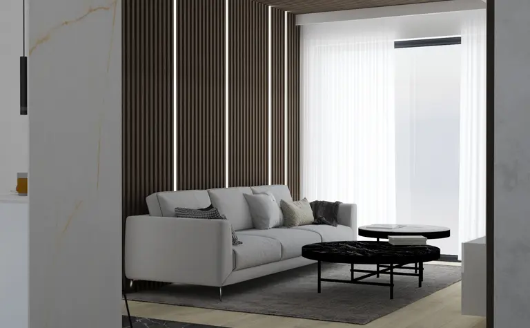 Wnętrze salonu w stylu minimalistycznym, nowoczesne z białą sofą i drewnianymi detalami.