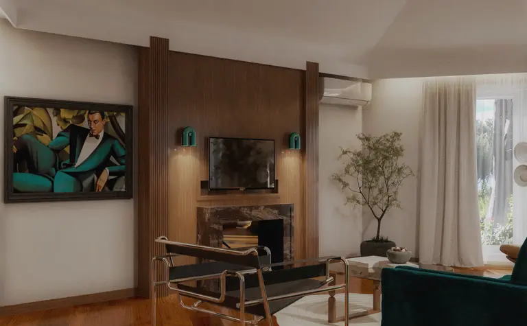 Wnętrze salonu w stylu art deco, quiet luxury, współczesnym z zieloną sofą.
