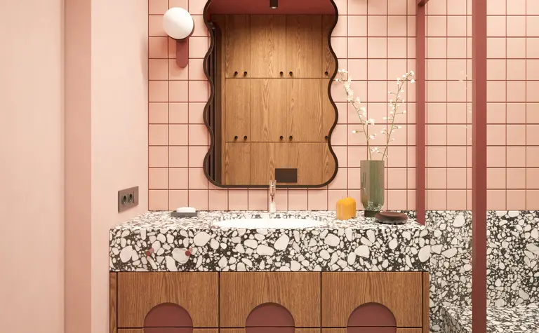 Wnętrze łazienki w stylu art deco z marmurowym blatem i drewnianymi meblami.
