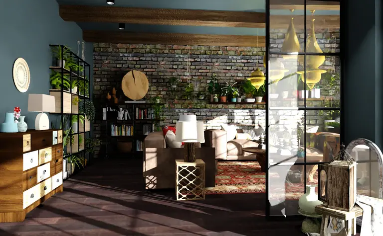 Wnętrze salonu boho z ceglaną ścianą i roślinami.