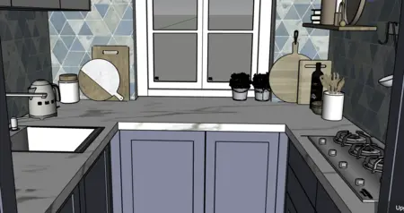 Kuchnia z niebieskimi kafelkami, drewnianymi detalami, minimalistyczne akcesoria i rośliny.