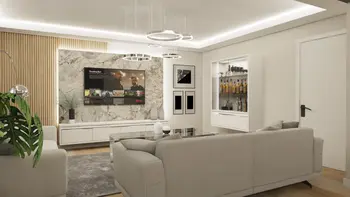 Wnętrze salonu z jasnymi meblami, telewizorem i dekoracjami glamour.