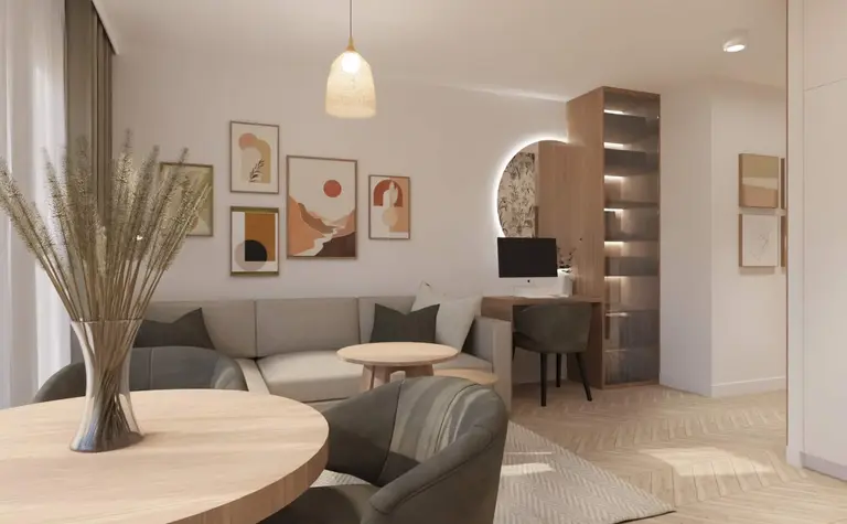 Wnętrze w stylu boho i nowoczesnym z szaro-beżową sofą i drewnianymi akcentami.