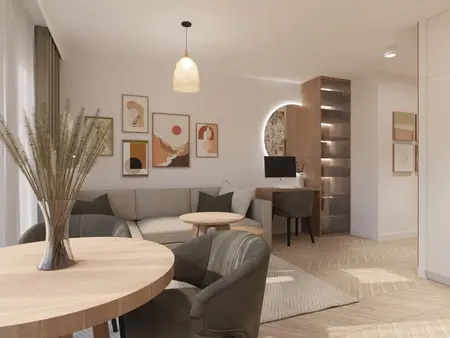 Wnętrze w stylu boho i nowoczesnym z szaro-beżową sofą i drewnianymi akcentami.