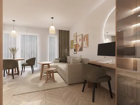 Wnętrze w stylu boho i nowoczesnym z sofą, stolikami i biurkiem.