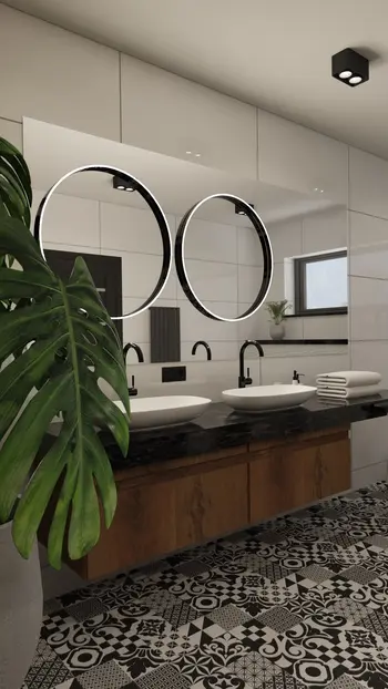 Nowoczesna łazienka z okrągłymi lustrami i rośliną, styl art deco.