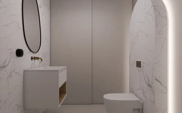 Nowoczesna łazienka z minimalistycznym designem, białą umywalką i marmurową ścianą.