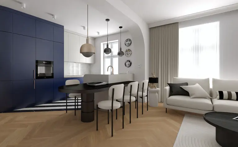 Wnętrze kuchni w stylu art deco i eklektycznym z niebieskimi meblami i nowoczesnymi lampami.