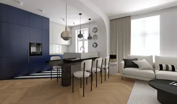 Wnętrze kuchni w stylu art deco i eklektycznym z niebieskimi meblami i nowoczesnymi lampami.