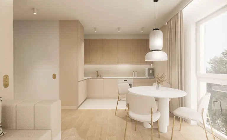 Wnętrze kuchni w stylu japandi, minimalistycznym i nowoczesnym z jasnymi meblami.