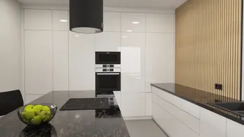 Nowoczesna kuchnia z białymi meblami i drewnianymi detalami w stylu industrialnym.