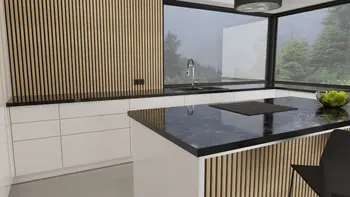 Wnętrze kuchni z industrialnymi akcentami, drewniane panele i czarny blat.