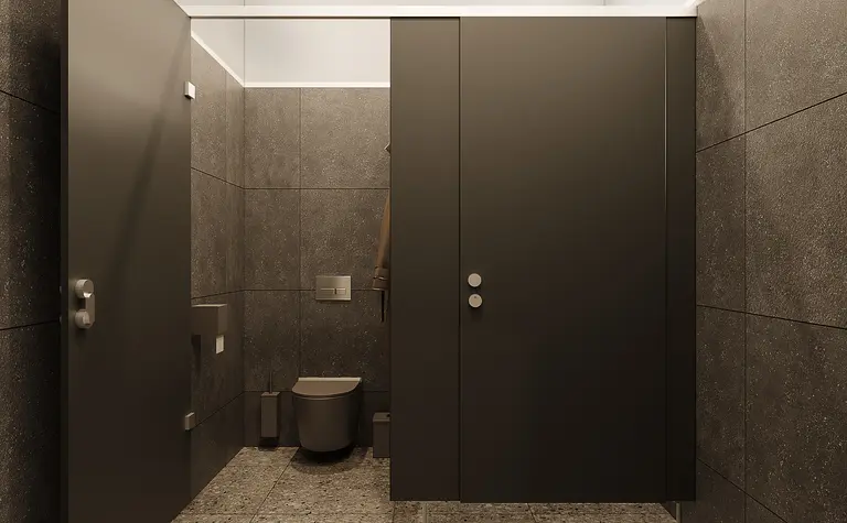 Łazienka w minimalistycznym stylu z ciemnymi drzwiami i nowoczesnymi wykończeniami.