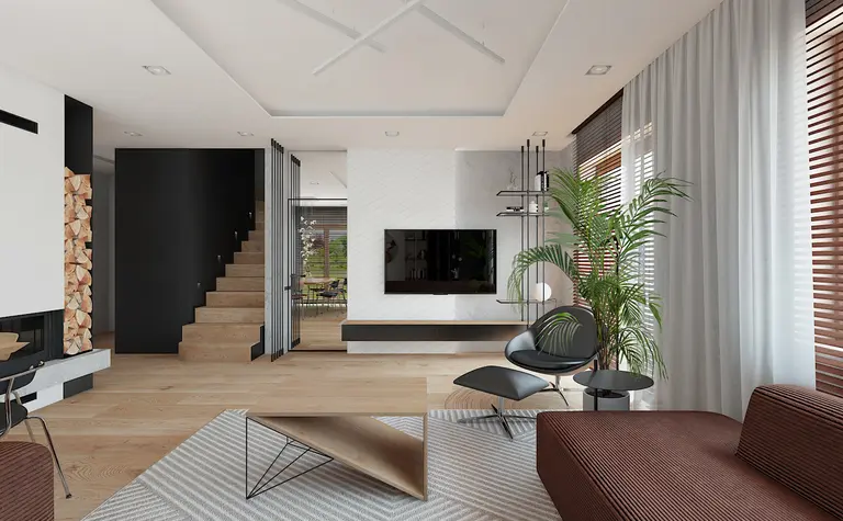 Wnętrze salonu z brązową sofą, szarym dywanem i zieloną roślinnością. Styl: dopamine decor, minimalistyczny.