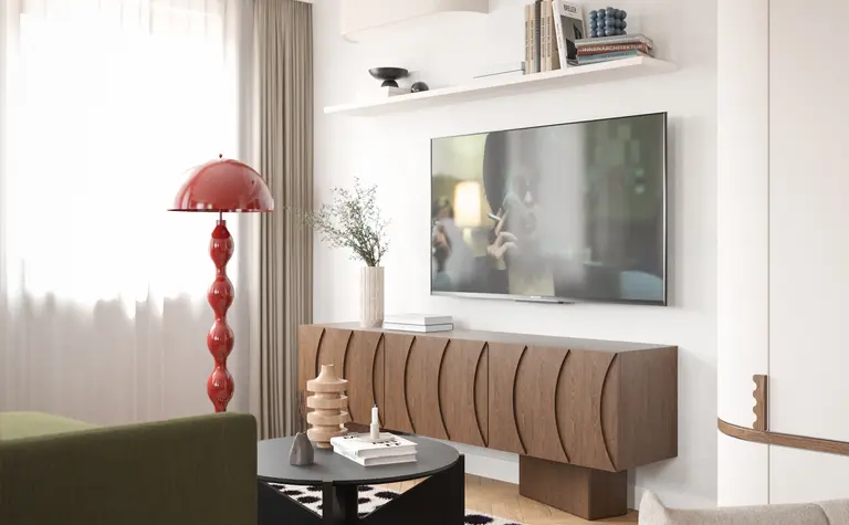 Wnętrze salonu w stylu art deco, eklektycznym i nowoczesnym z czerwonymi akcentami.