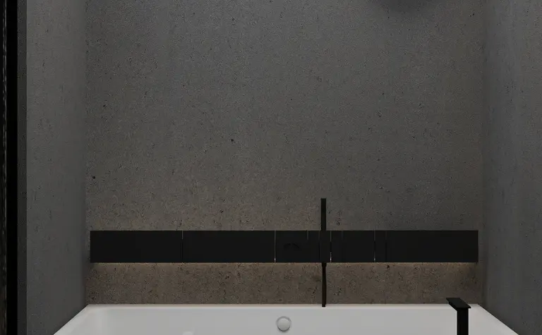 Wnętrze łazienki z betonowymi ścianami i wanną w stylu industrialnym i minimalistycznym.