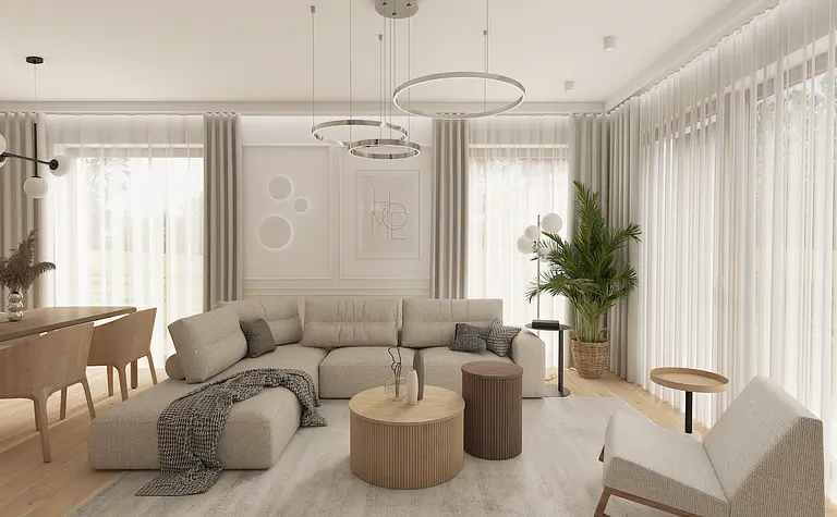 Wnętrze salonu w stylu japandi i minimalistycznym, z jasnymi meblami i roślinami.