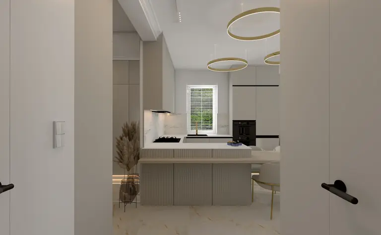 Wnętrze kuchni w stylu art deco i glamour z jasnymi meblami