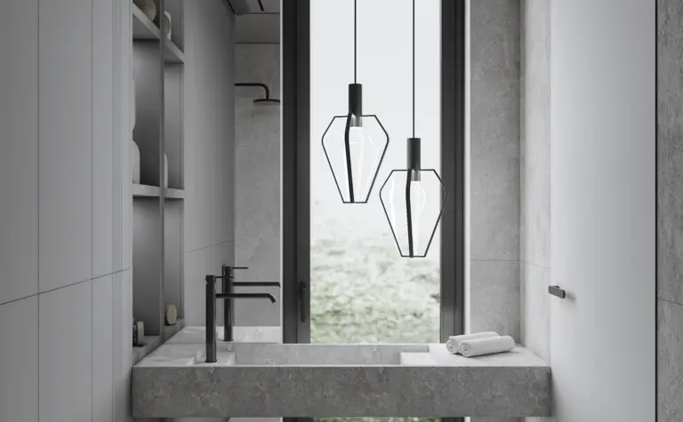 Minimalistyczna łazienka z szarymi ścianami i nowoczesnymi lampami.