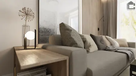 Wnętrze salonu z minimalistyczną sofą i lampą w stylu industrialnym.