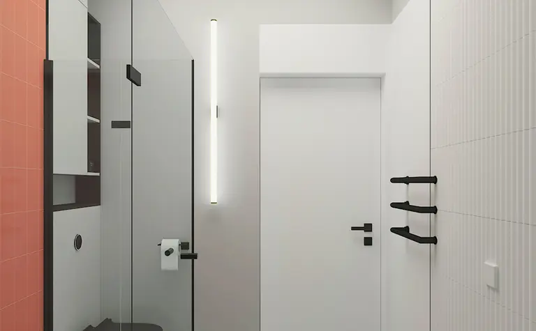 Wnętrze łazienki z minimalistycznym designem, industrialnymi akcentami, nowoczesną armaturą i elementami soft minimalizmu.