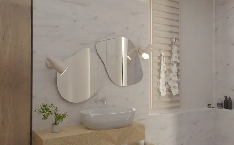 Nowoczesna łazienka z drewnianą szafką i lustrem w stylu boho.
