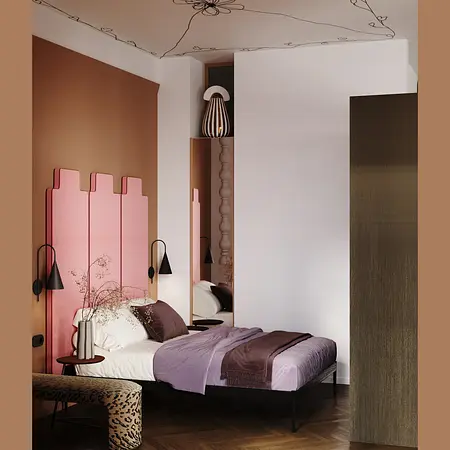 Sypialnia w stylach eklektycznym i minimalistycznym z różowym akcentem