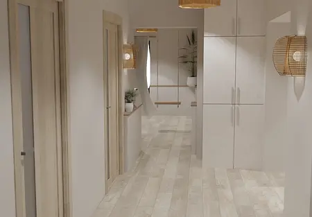 Przestronny przedpokój w naturalnych barwach z drewnianymi drzwiami, szafą wnękową oraz ozdobnymi lampami rattanowymi. Na końcu korytarza dekoracyjne rośliny.