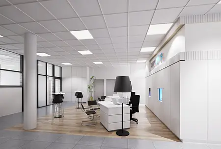 Nowoczesne biuro z białymi meblami i industrialnymi akcentami, jasna przestrzeń robocza.