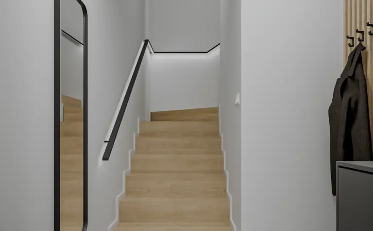 Przedpokój z minimalistycznym wystrojem, drewnianymi schodami i nowoczesnym lustrem.