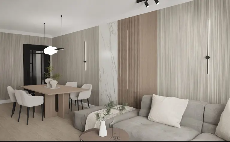 Wnętrze salonu minimalistycznego z beżowymi meblami i drewnianymi wykończeniami.