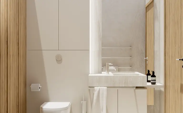 Nowoczesna łazienka w stylu japandi z minimalistycznym wykończeniem i drewnianymi detalami.