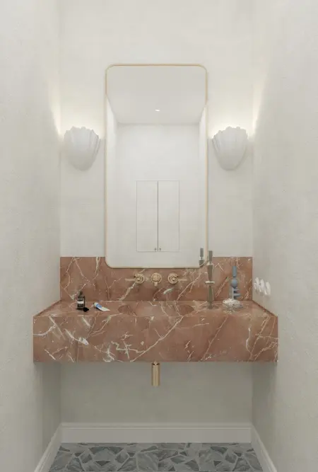 Wnętrze łazienki z marmurową umywalką, lustrem i elementami art deco, minimaluxe, quiet luxury.