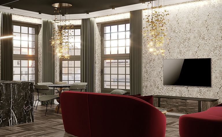 Wnętrze salonu w stylu art deco z czerwonymi sofami i marmurowymi akcentami.