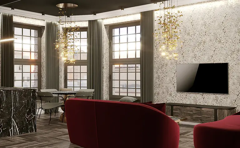 Wnętrze salonu w stylu art deco z czerwonymi sofami i marmurowymi akcentami.
