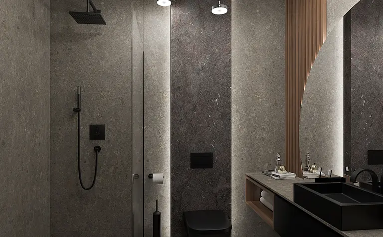 Nowoczesna łazienka z minimalistycznym wystrojem, szarymi ścianami i czarnymi detalami.