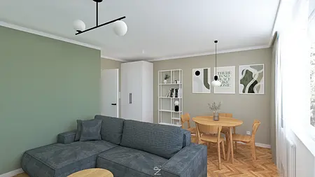 Wnętrze salonu w stylu boho i minimalistycznym z zieloną kanapą i drewnianym stołem.