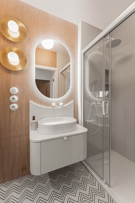 Nowoczesna łazienka z drewnianą ścianą i minimalistycznymi akcentami, styl boho, japandi.