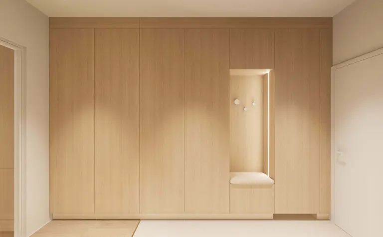 Przedpokój w stylu japandi z minimalistycznym umeblowaniem i nowoczesnymi detalami.