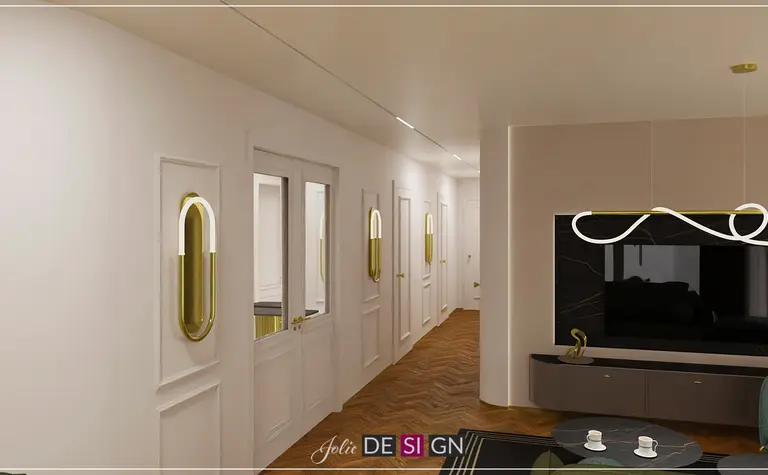Korytarz w stylu art deco z jasnymi ścianami i drewnianą podłogą.