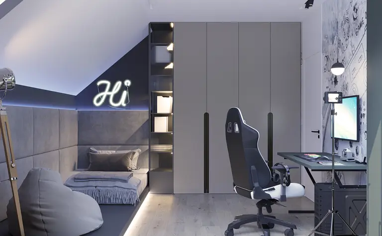 Wnętrze poddasza z szarym biurkiem, akcentami boho i skandynawskimi.