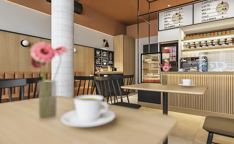 Wnętrze kawiarni z eklektycznym stylem, drewniane meble i różowe kwiaty