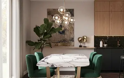 Nowoczesna jadalnia z zielonymi krzesłami i marmurowym stołem w stylu quiet luxury, soft minimalizm.